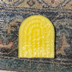 5/$8 Yellow Arch-Shaped Decorative candle